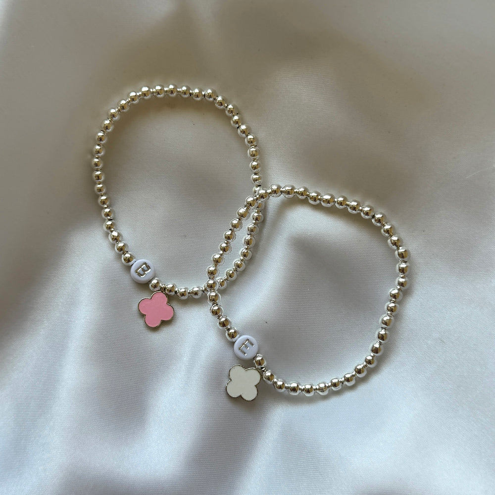 
                      
                        Silver clover charm initial bracelet
                      
                    