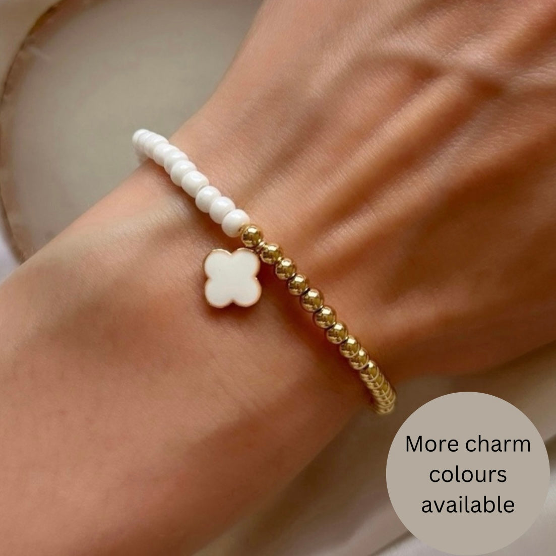 Pearl and gold four leaf clover bracelet