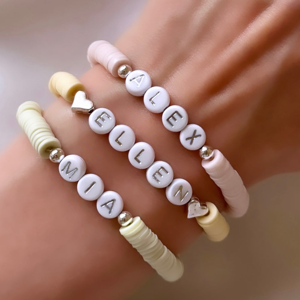 
                      
                        Heishi clay bead name bracelet - gold or silver lettering
                      
                    