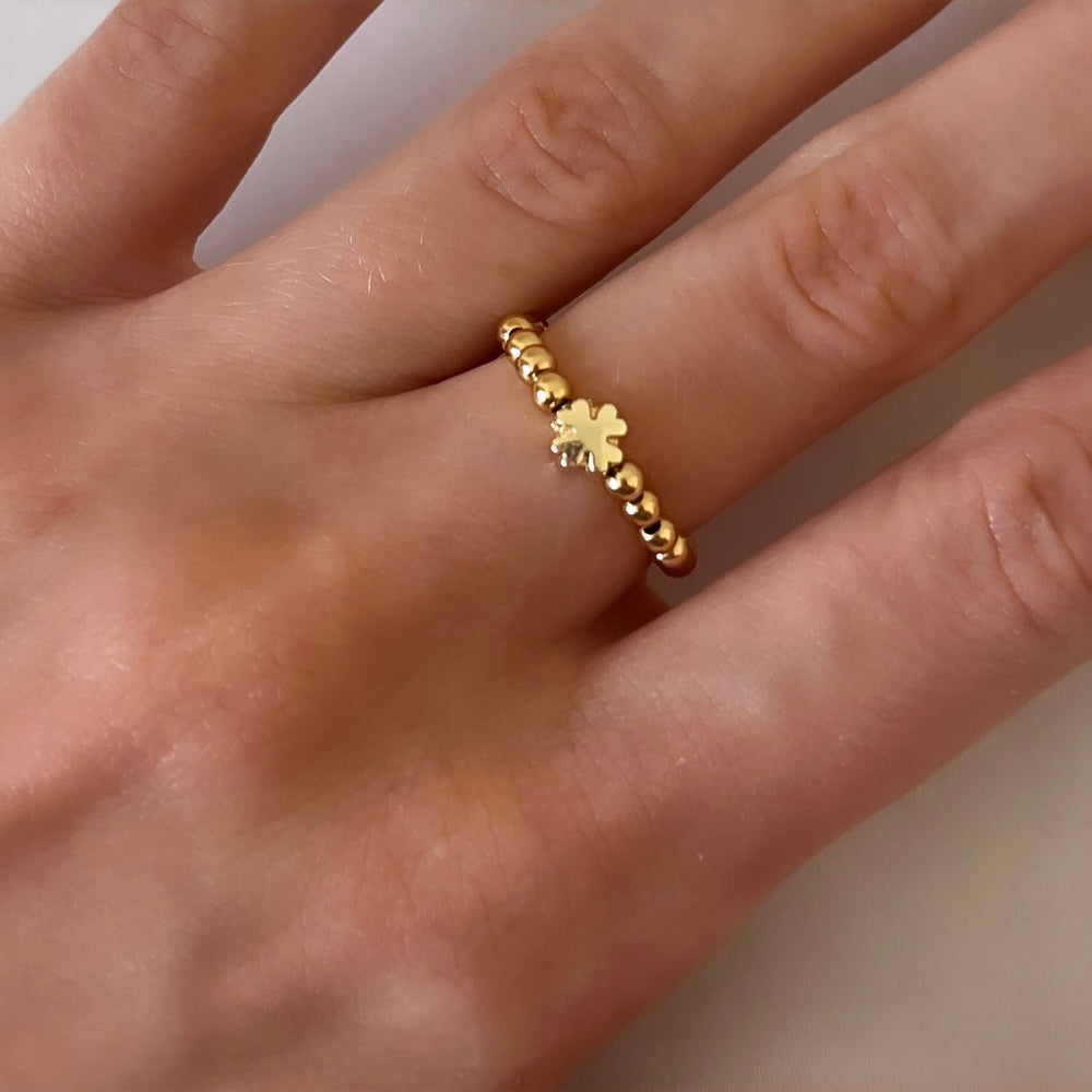 Gold four leaf clover ring