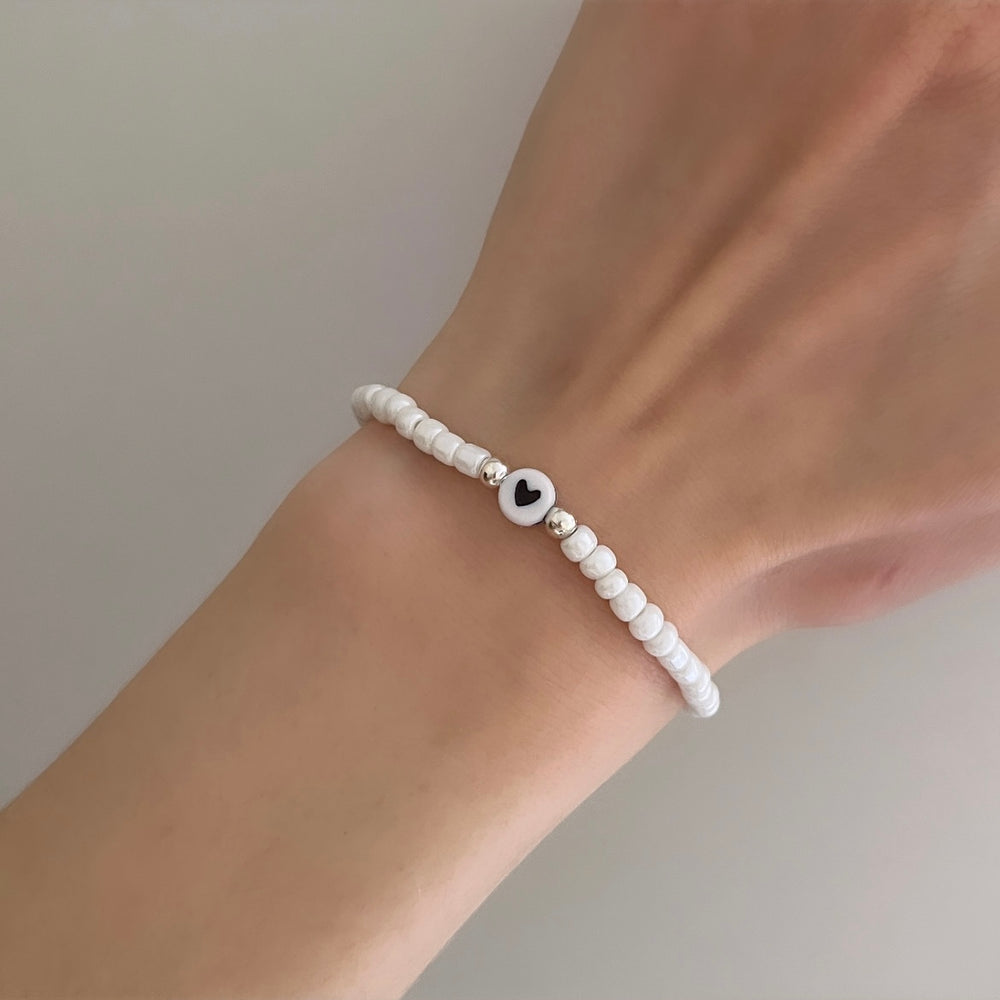 
                      
                        Simple heart stacking bracelet - pearl white
                      
                    