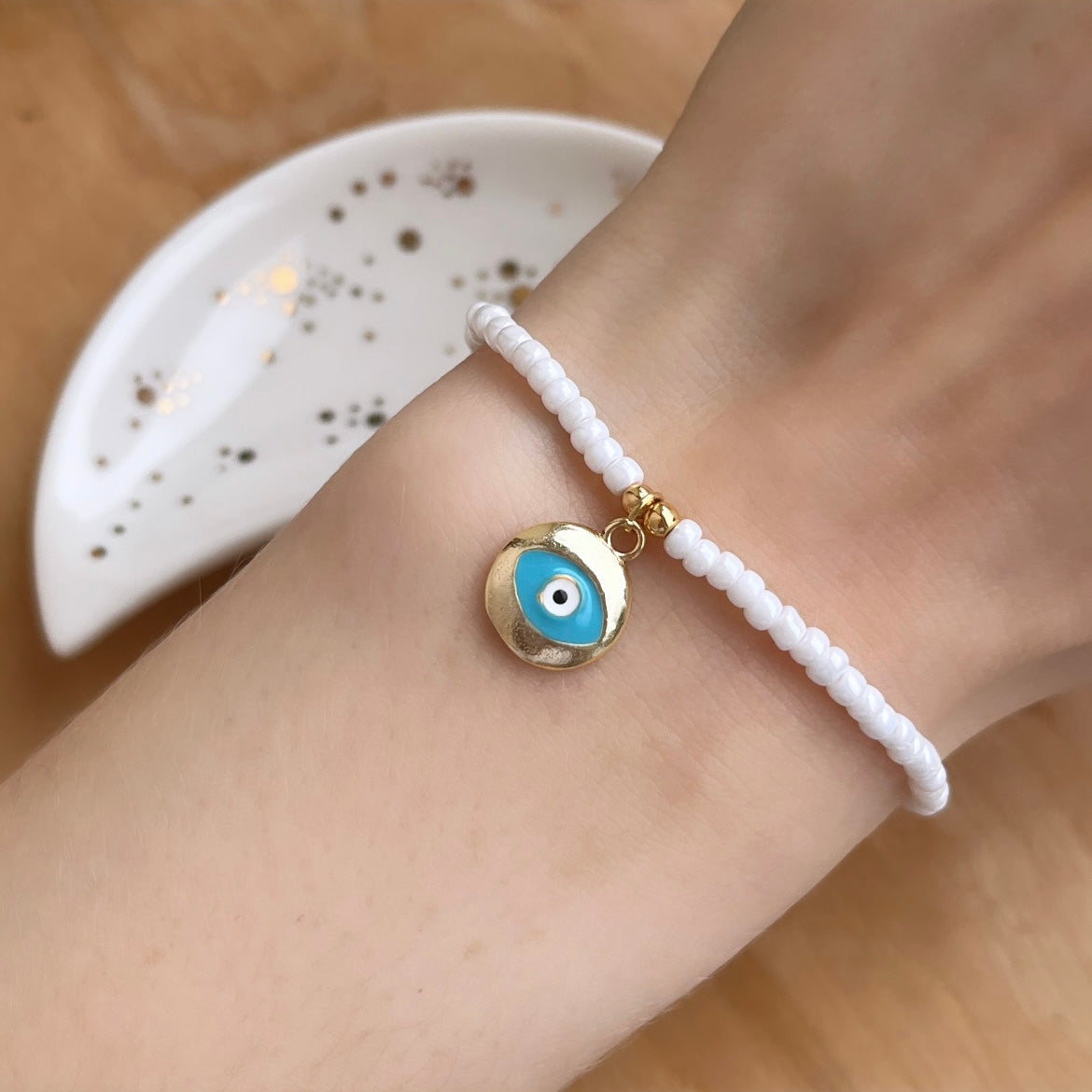 Gold and white evil eye charm bracelet