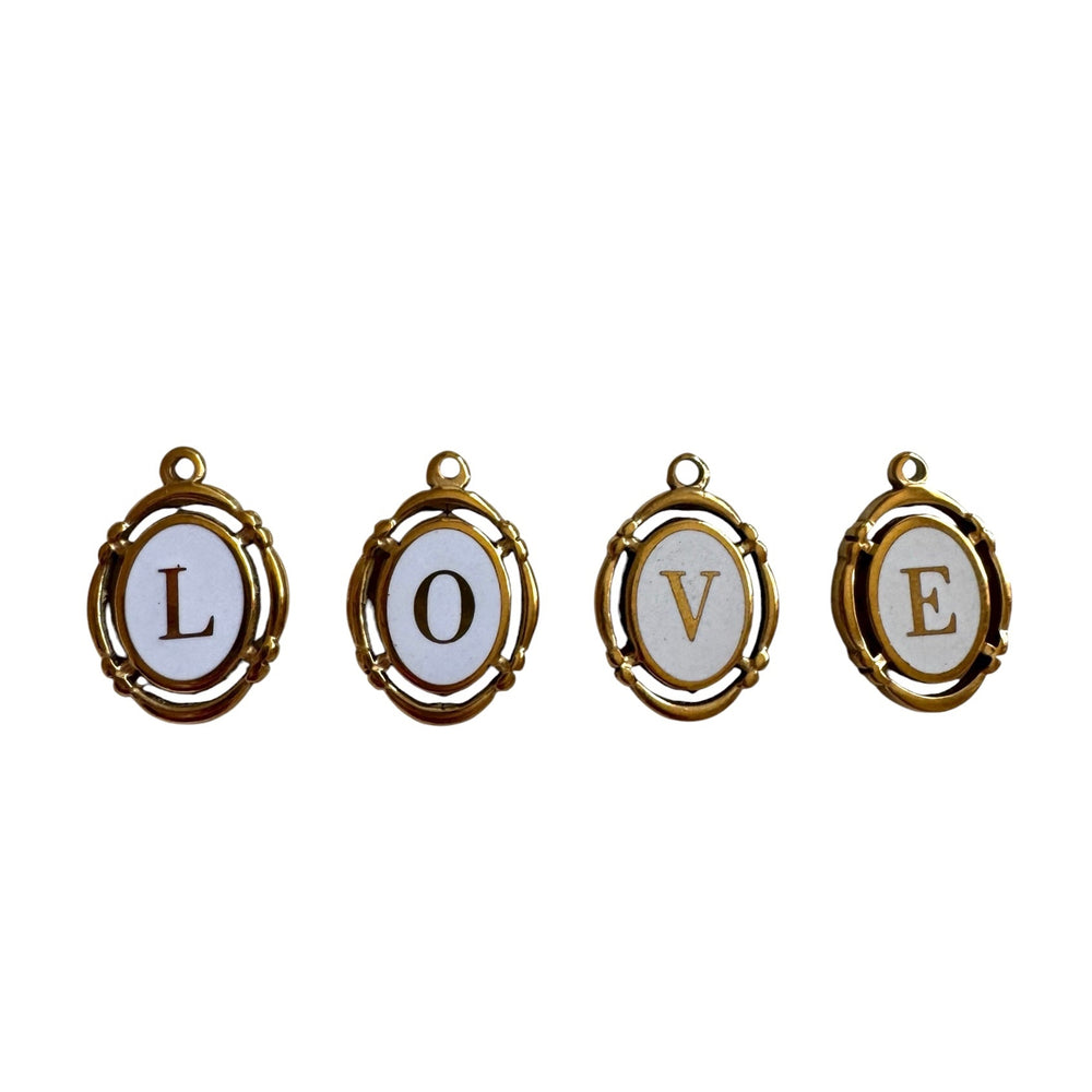 
                      
                        Vintage Oval Initial Charm
                      
                    