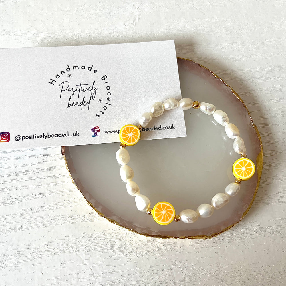 
                      
                        Lemon pearl bracelet
                      
                    