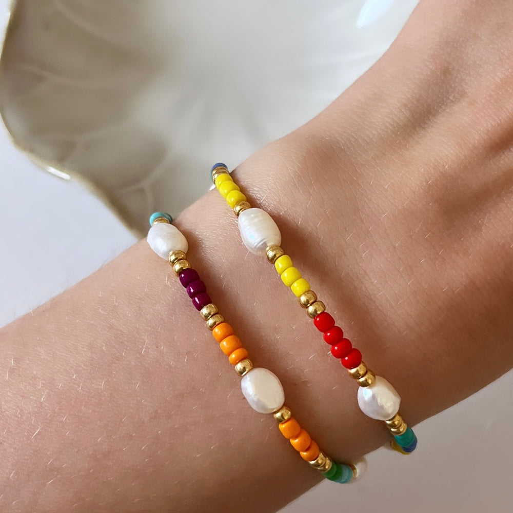 
                      
                        Colourful pearl and gold bracelet
                      
                    