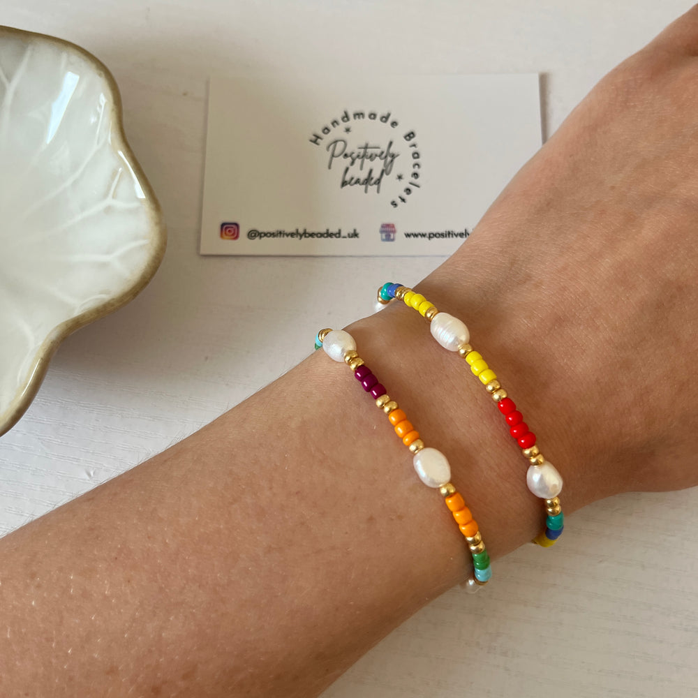 
                      
                        Colourful pearl and gold bracelet
                      
                    