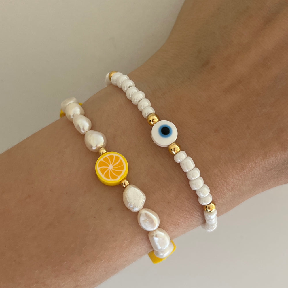 
                      
                        Lemon pearl bracelet
                      
                    