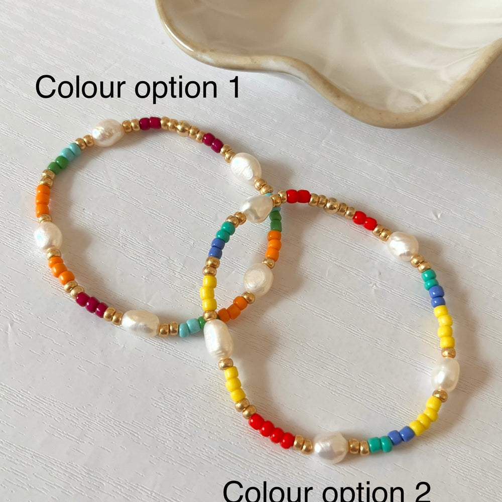 
                      
                        Colourful pearl and gold bracelet
                      
                    