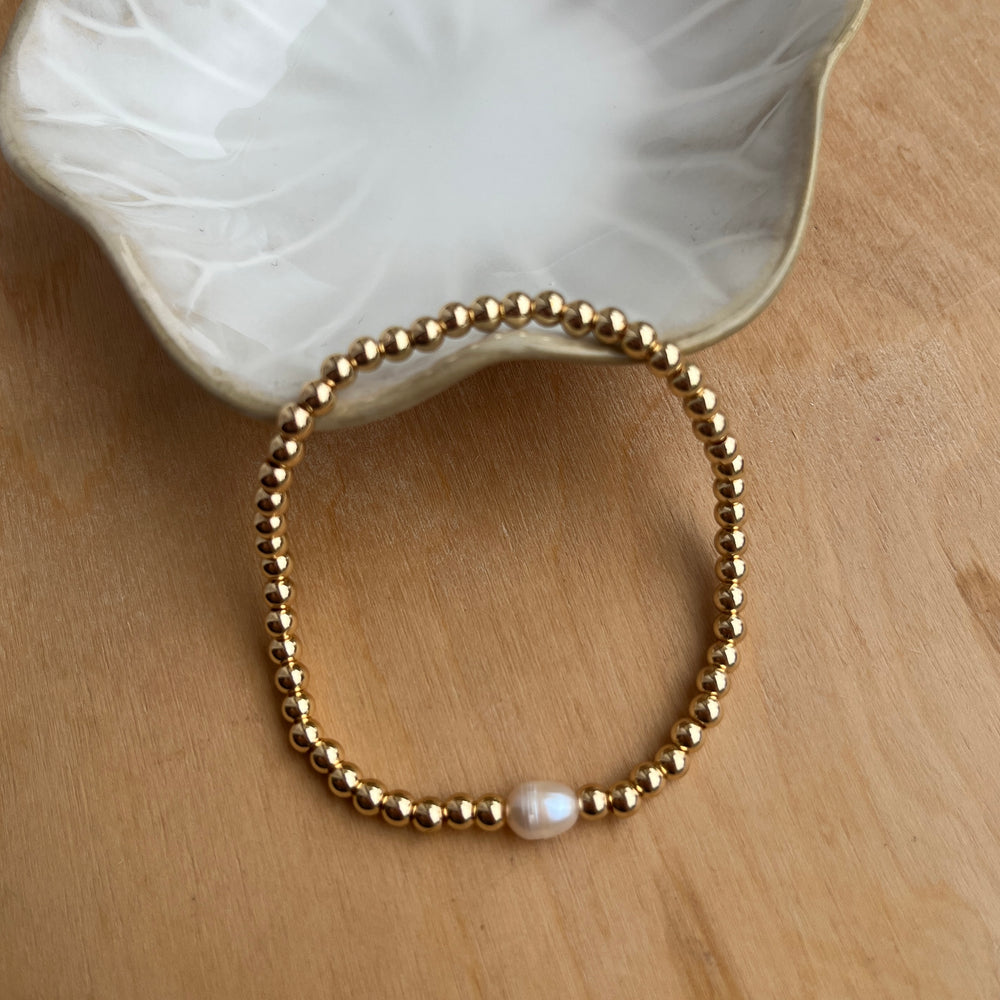 
                      
                        Simple pearl beaded bracelet
                      
                    