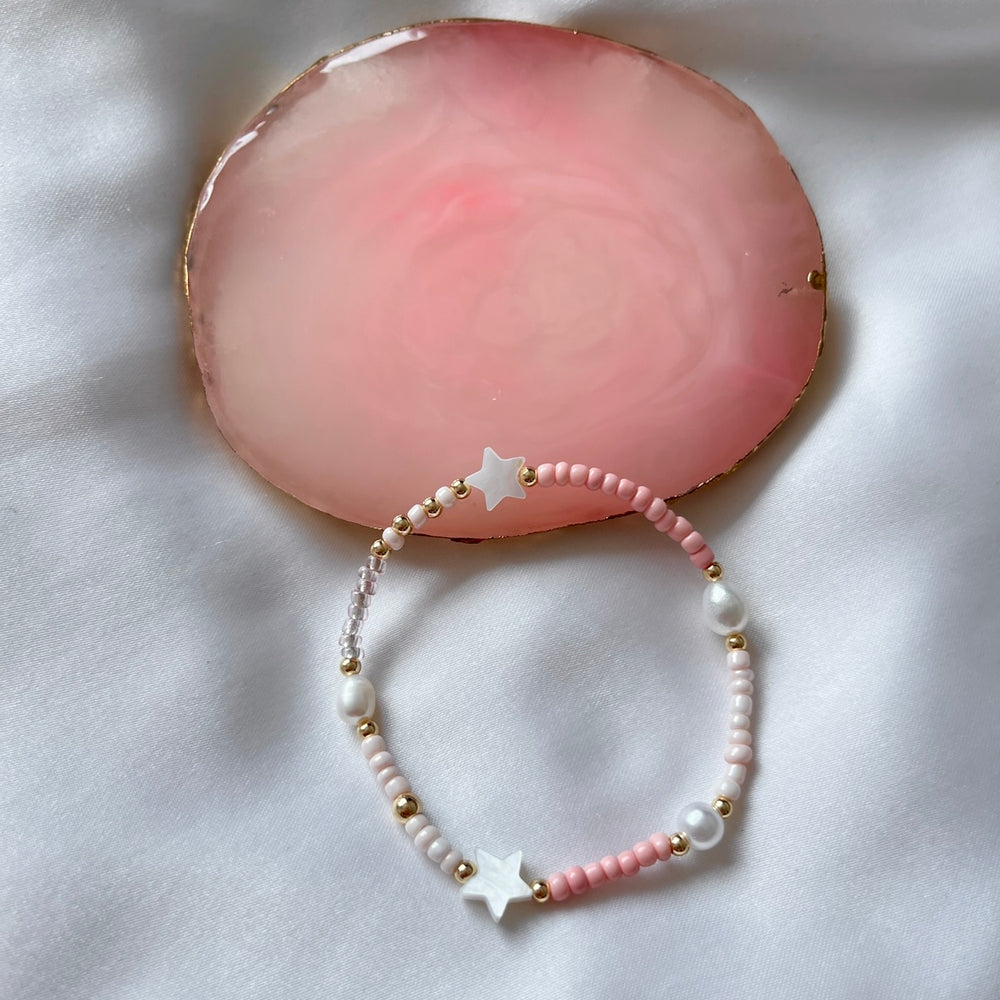 
                      
                        Pink and pearl eclectic bracelet
                      
                    