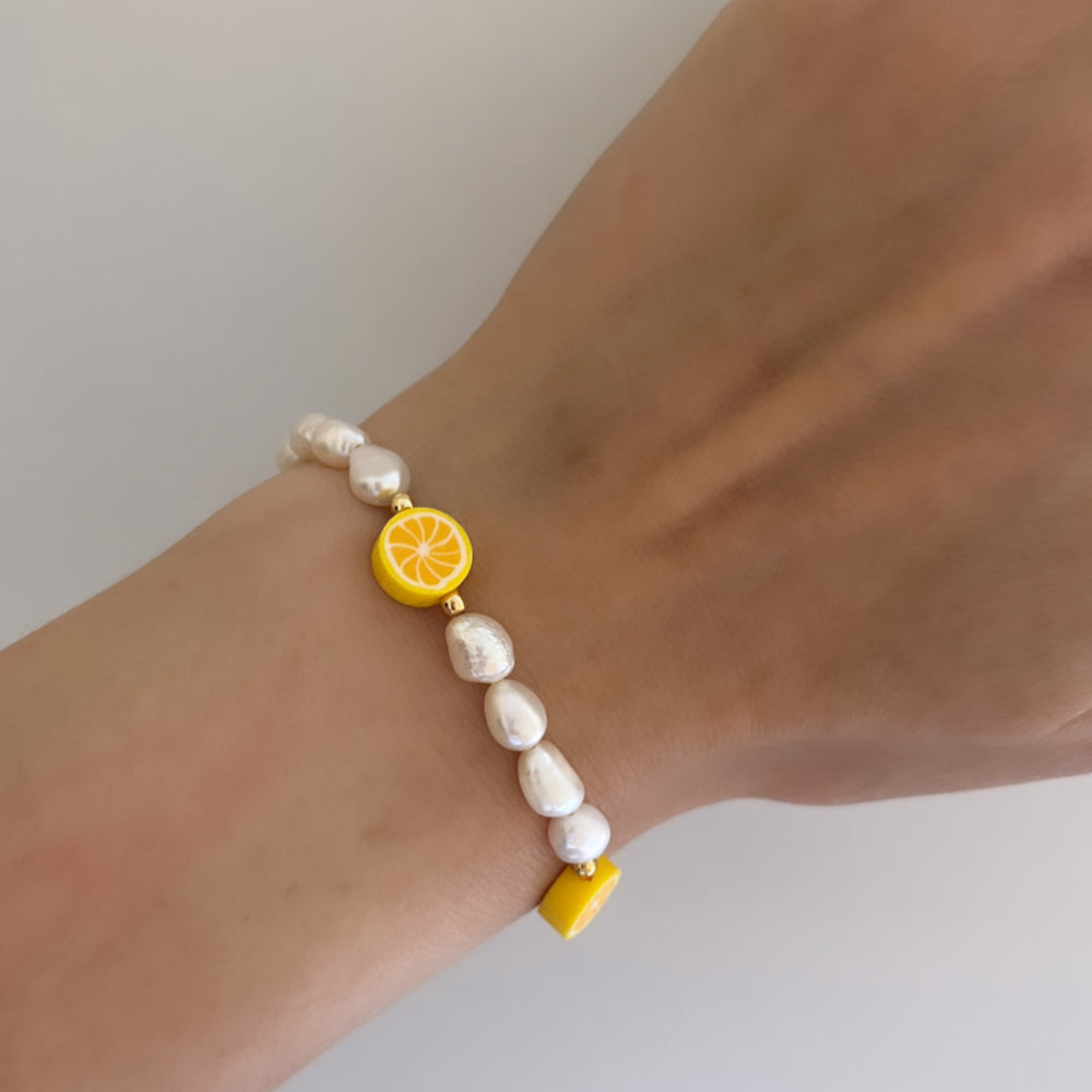 
                      
                        Lemon pearl bracelet
                      
                    