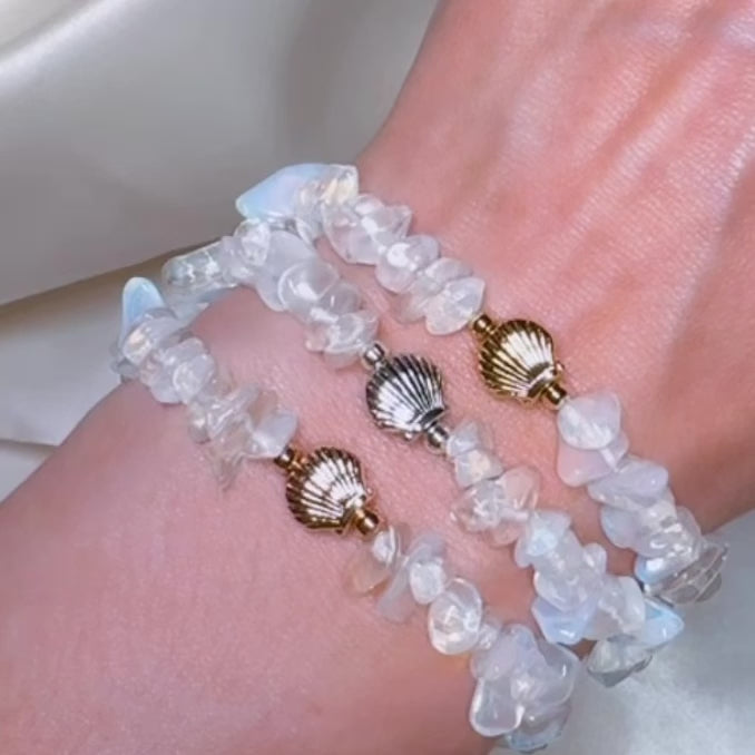 
                      
                        Load and play video in Gallery viewer, White opalite oyster bead crystal bracelet
                      
                    