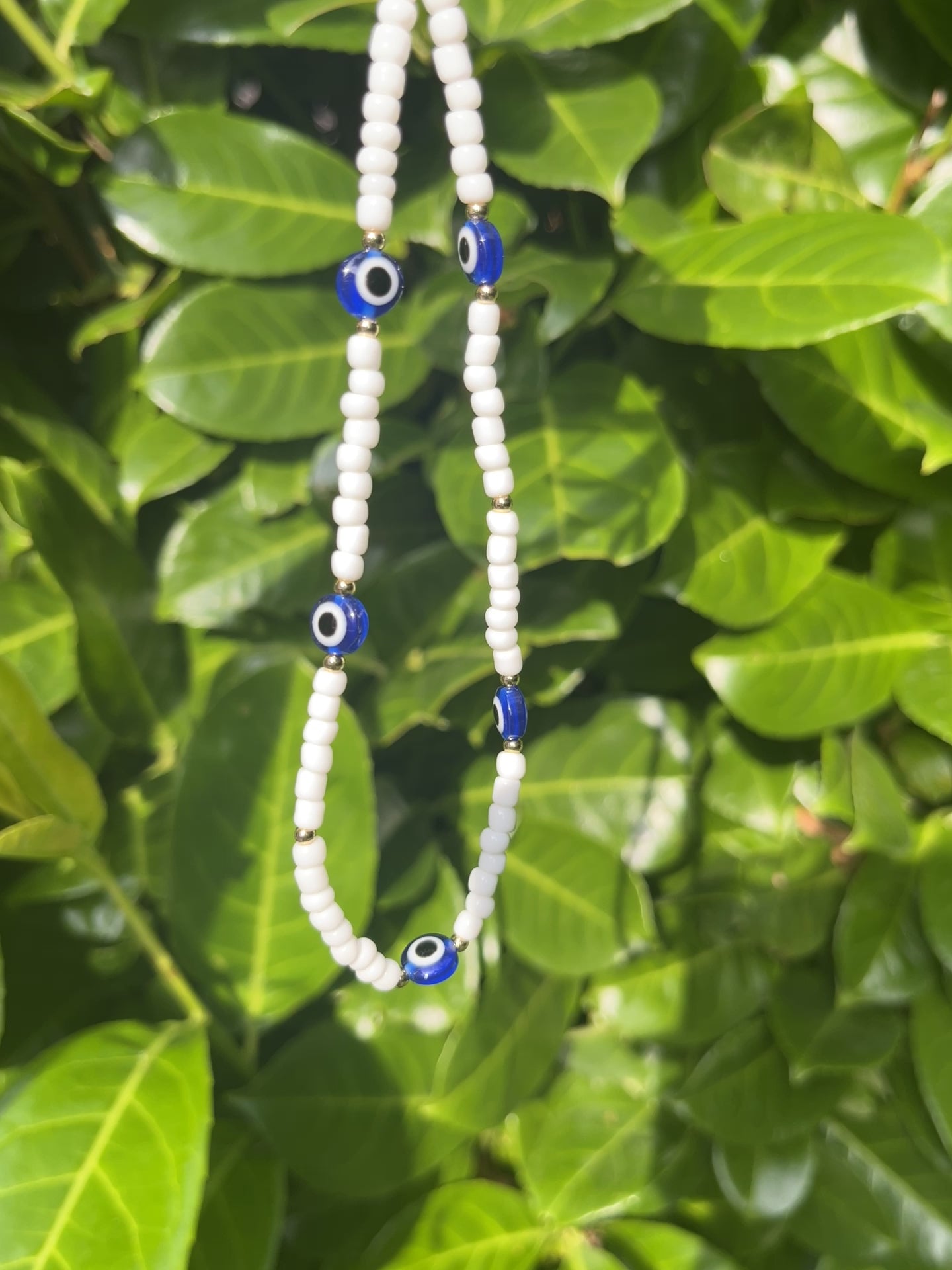 Beaded phone strap - evil eye