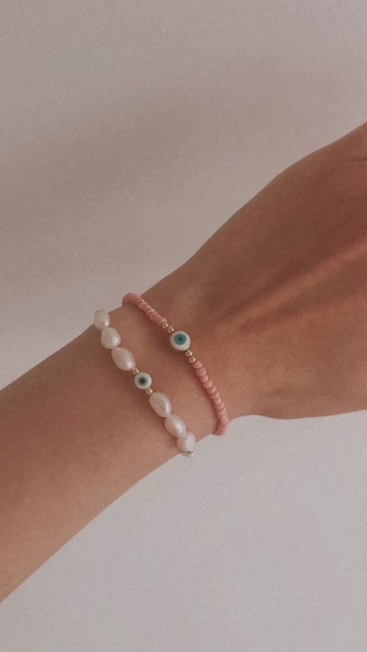 Light blue evil eye and pearl bracelet