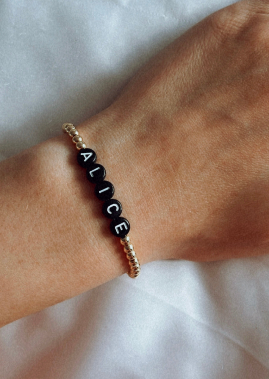 Minimalist gold and black name bracelet