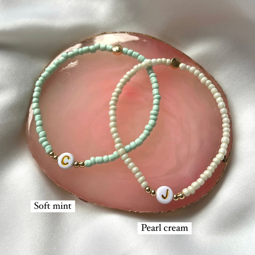 
                      
                        Minimalist neutral initial bracelet - Positively Beaded
                      
                    