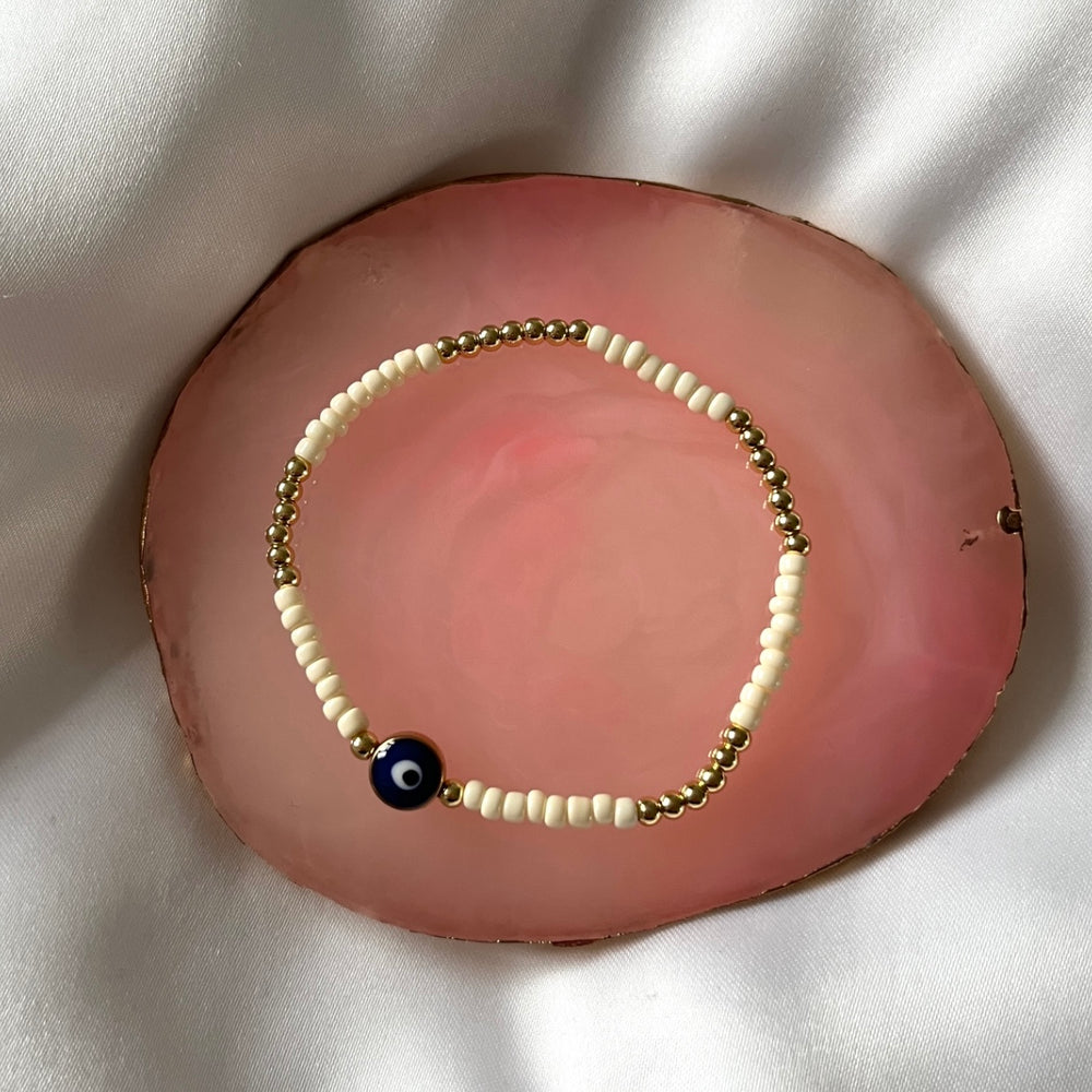 Cream and gold evil eye stacking bracelet - Positively Beaded