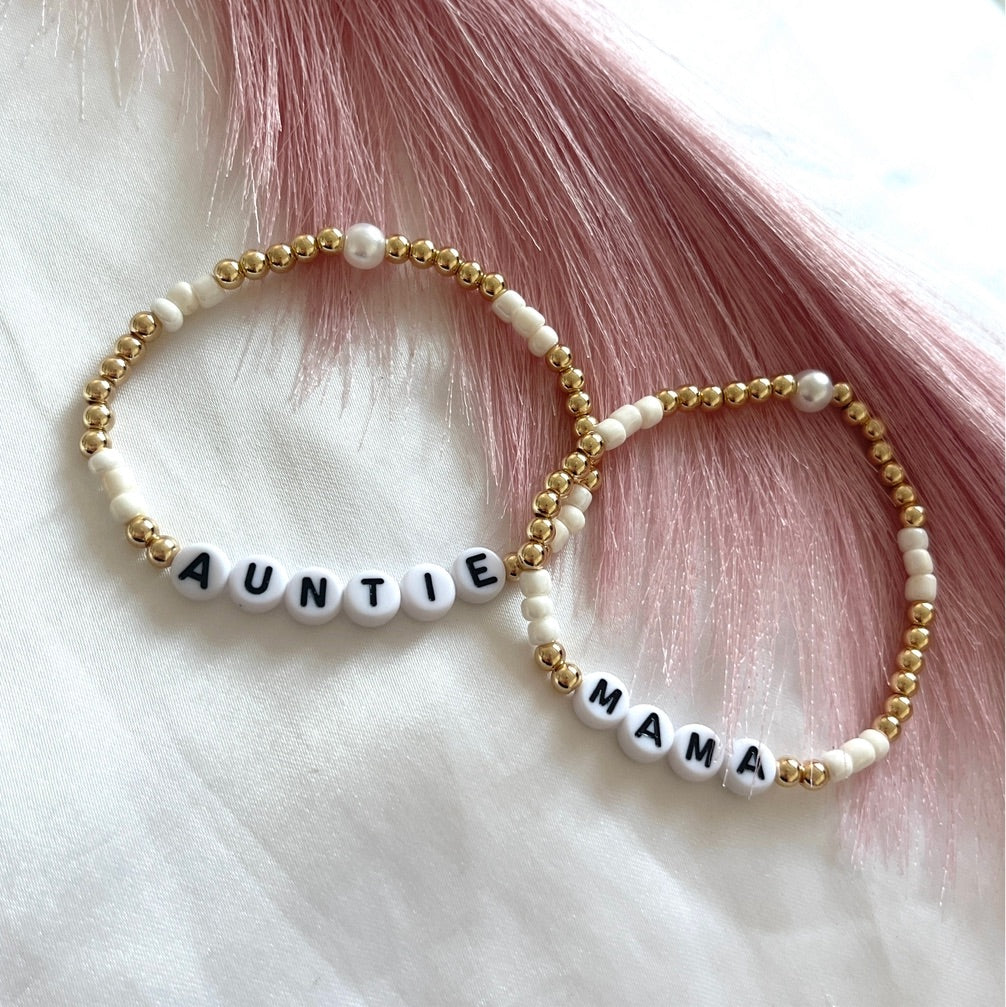 Pearl and gold name bracelet