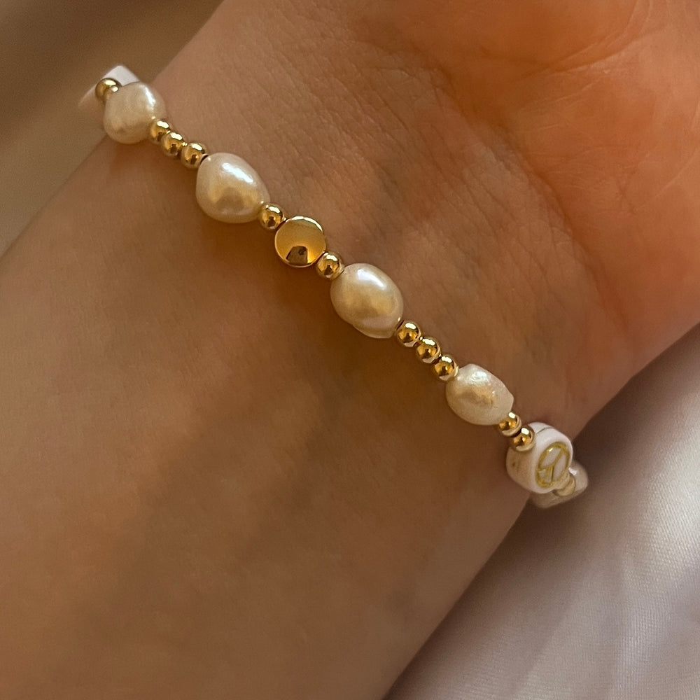 
                      
                        Peace and pearls beaded bracelet - Positively Beaded
                      
                    