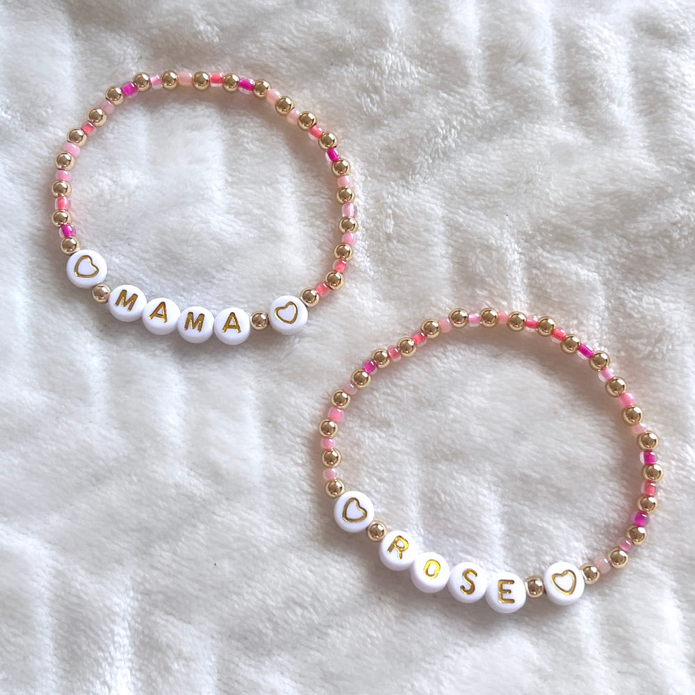 
                      
                        Pink and gold heart name bracelet - Positively Beaded
                      
                    